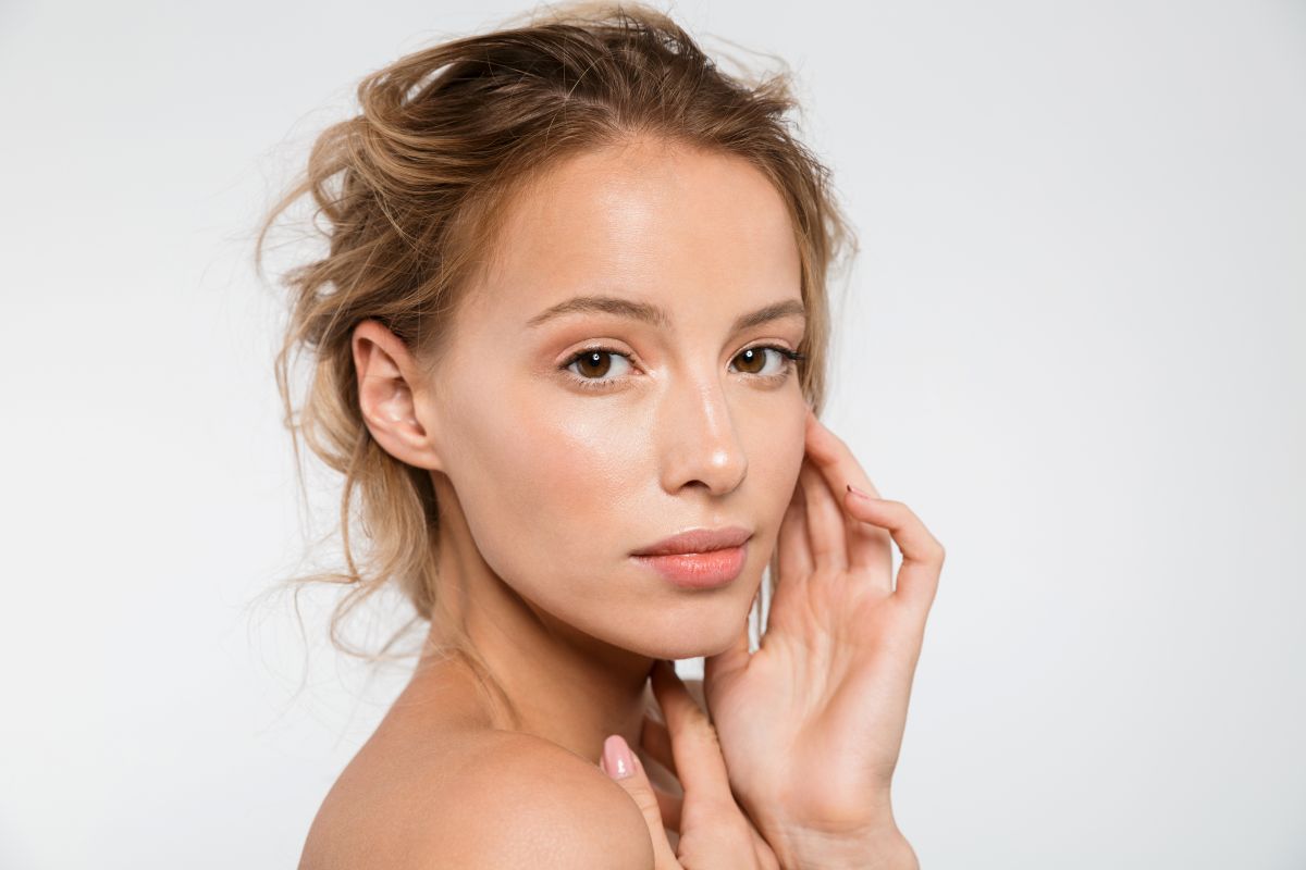 young woman looks at camera